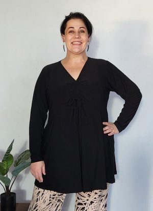 Lady wearing a Black Nadia Rushed V-Neck Top in Black Bon-Bon from J&S Creations Clothing made to fit