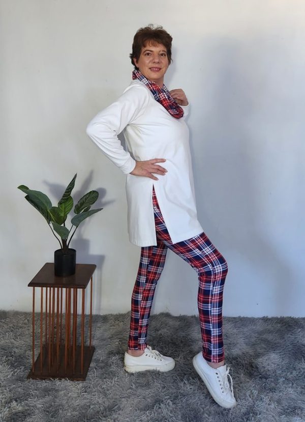 Stylish woman posing in a custom-made Lilly 3-Piece Set by J&S Creations, featuring a long sleeve tunic top in Milk Cosy Spandex Knit, paired with red and navy checkered DTY brush knit leggings and a matching snood. Made to fit South African women with comfort and flair, ideal for winter layering in sizes Small to 6XL.
